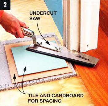 Use an undercut saw to cut the door trim and fit the cement board and the floor tile underneath it