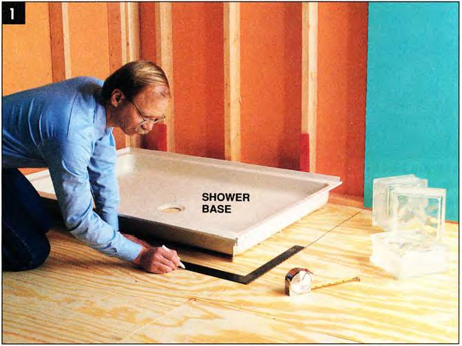 Use the shower base to locate the drain and outline the shower design